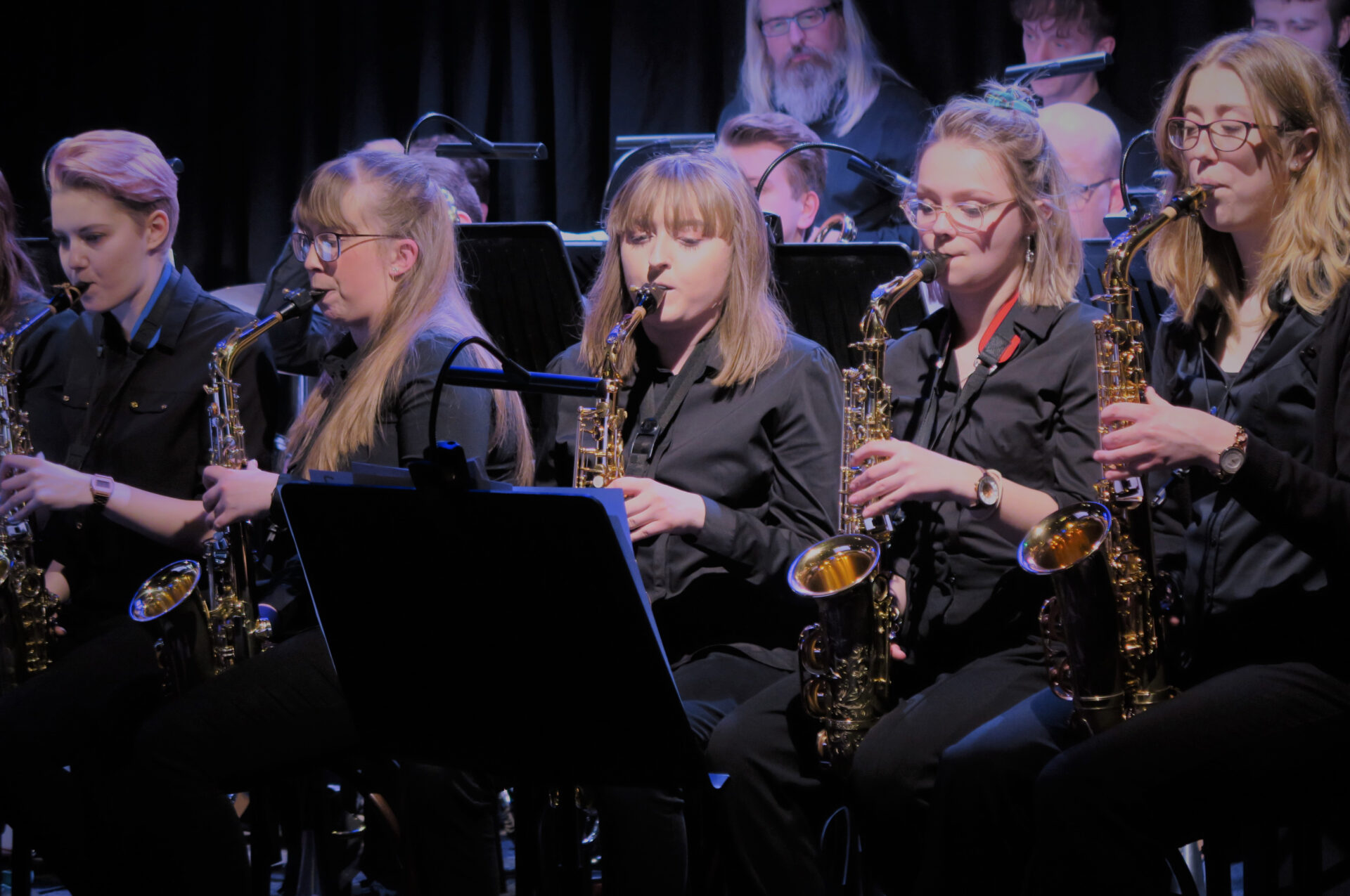 Members of the NTU Big Band playing on stage.