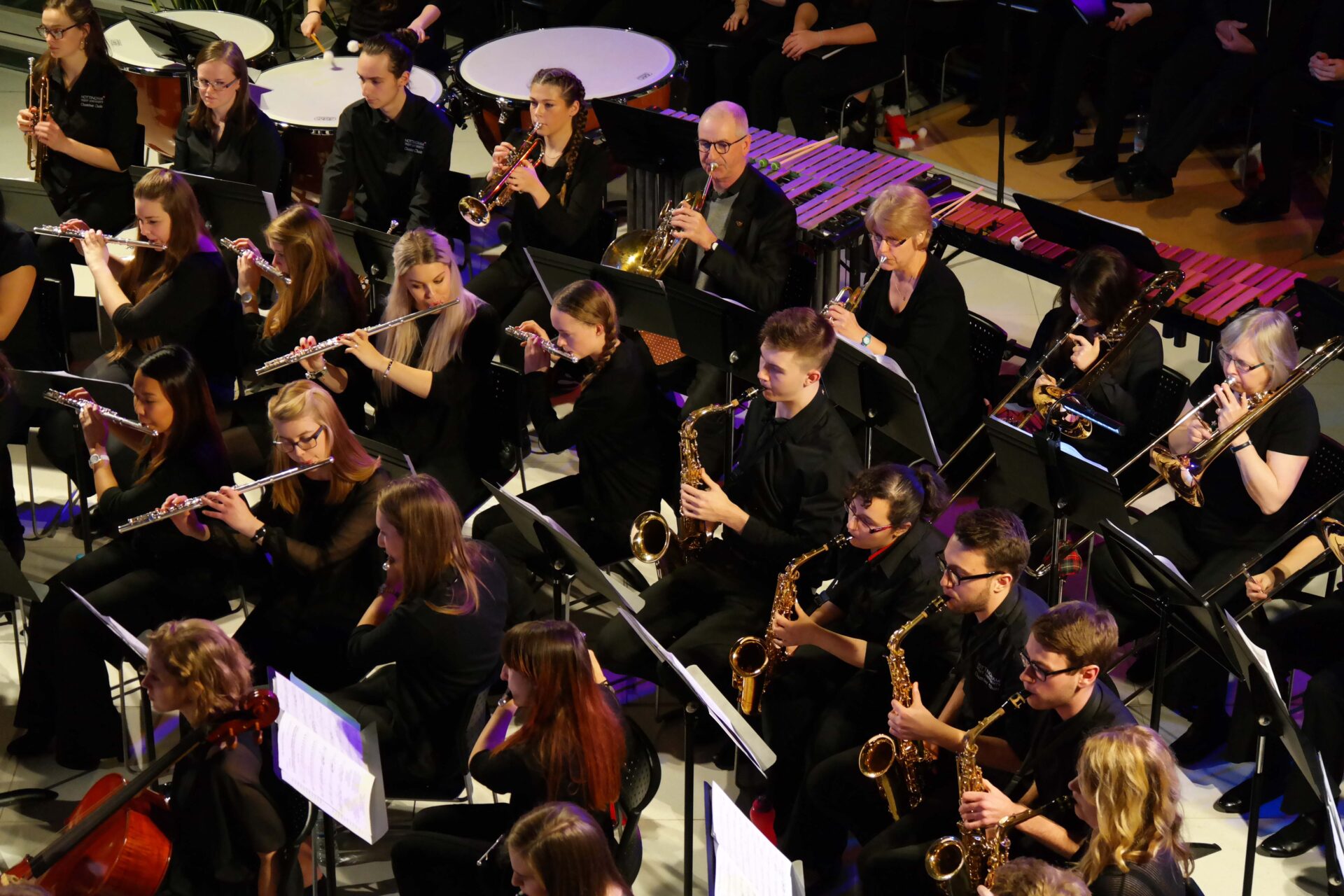 The NTU Concert Band playing on stage.